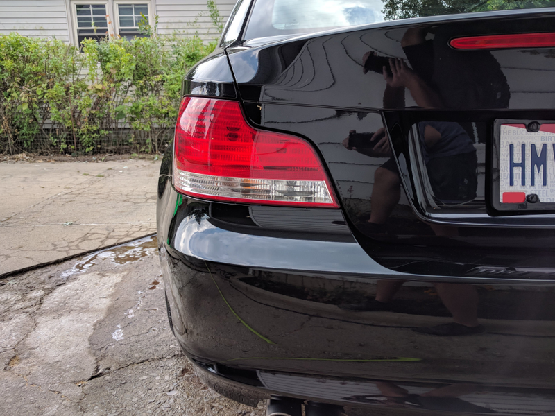 Illustration for article titled Finally put plates on the 128i and gave it a proper wash